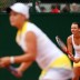 Despite fighting hard, Casey Dellacqua (R) and Ashleigh Barty (foreground, blurred) went down 3-6 6-4 6-3 to Mona Barthel of Germany and Liga Dekmeijere of Latvia  in the first round of the women's doubles at the French Open; Getty Images