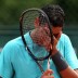 PARIS, FRANCE - JUNE 02:  Nick Kyrgios of Australia reacts during his boys' singles match against Maxime Janvier of France on day eight of the French Open at Roland Garros on June 2, 2013 in Paris, France.  (Photo by Matthew Stockman/Getty Images)