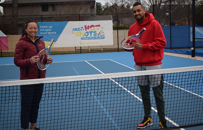 Bai and Kyrgios signing racquets 700 x 450