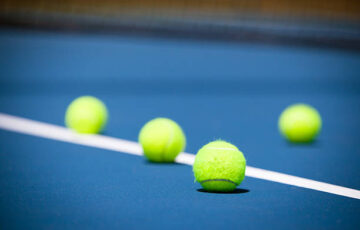 Tennis court with a ball and net closeup in Melbourne, Australia