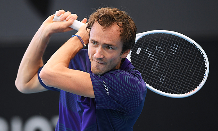 ADELAIDE, AUSTRALIA - JANUARY 06:  Daniel Medvedev  
 hits a backhand against  Karen Khachanov  during day six of the 2023 Adelaide International at Memorial Drive on January 06, 2023 in Adelaide, Australia. (Photo by Mark Brake/Getty Images)