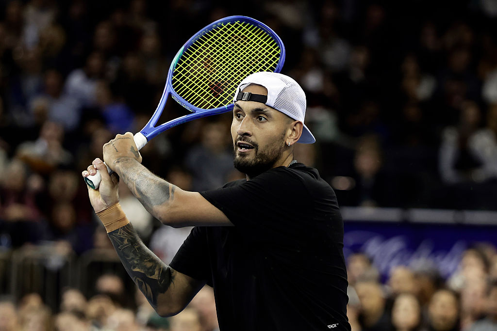 NEW YORK, NEW YORK - DECEMBER 08: Nick Kyrgios of Australia returns a shot to Tommy Paul of the United States during the Garden Cup at Madison Square Garden on December 08, 2025 in New York City. (Photo by Adam Hunger/Getty Images)