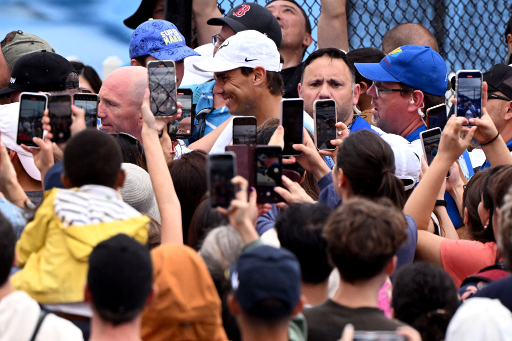 Spain's Rafael Nadal walks through the crowds at the Brisbane International tennis tournament in Brisbane on January 1, 2024. (Photo by William WEST / AFP) / --IMAGE RESTRICTED TO EDITORIAL USE - STRICTLY NO COMMERCIAL USE-- (Photo by WILLIAM WEST/AFP via Getty Images)