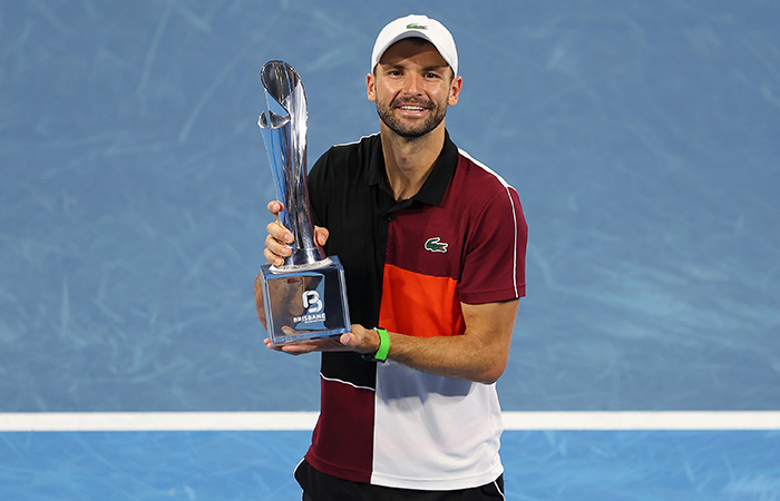 BRISBANE, AUSTRALIA - JANUARY 07: Grigor Dimitrov of Bulgaria holds the winners trophy after his final match against Holger Rune of Denmark during day eight of the  2024 Brisbane International at Queensland Tennis Centre on January 07, 2024 in Brisbane, Australia. (Photo by Chris Hyde/Getty Images)