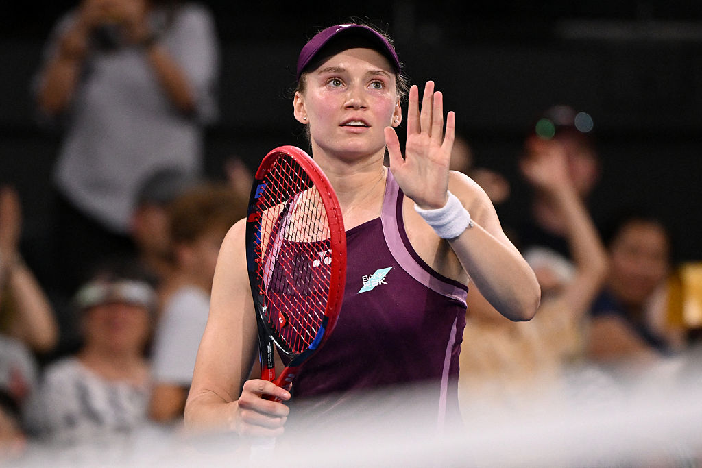 Elena Rybakina of Kazakhstan waves to the crowd after winning her women's singles match against Zhang Shuai of China at the Brisbane International tennis tournament in Brisbane on January 6, 2026. (Photo by William WEST / AFP via Getty Images) / --IMAGE RESTRICTED TO EDITORIAL USE - STRICTLY NO COMMERCIAL USE--