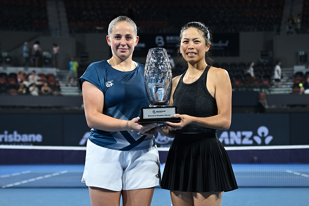 BRISBANE, AUSTRALIA - JANUARY 10: Jelena Ostapenko of Latvia and Su-Wei Hsieh of Chinese Taipei pose with the trophy after winning their Women's Doubles Final match against Cristina Bucsa of Spain and Ellen Perez of Australia during day six of the 2026 Brisbane International at Pat Rafter Arena on January 10, 2026 in Brisbane, Australia. (Photo by Albert Perez/Getty Images)