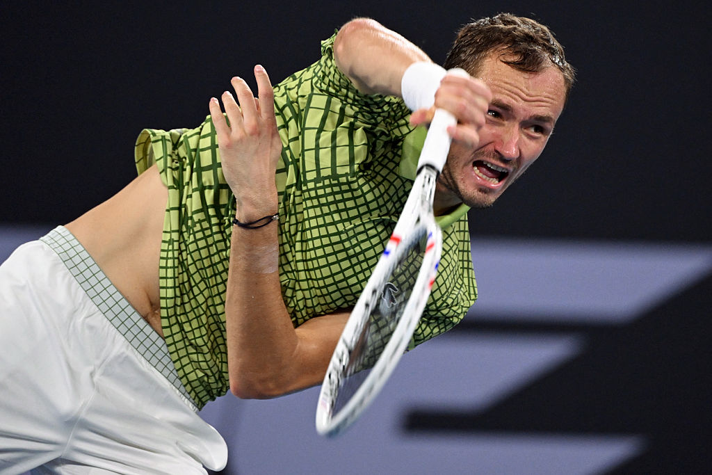 Daniil Medvedev of Russia hits a return during his men's singles match against Marton Fucsovics of Hungary at the Brisbane International tennis tournament in Brisbane on January 5, 2026. (Photo by William WEST / AFP via Getty Images) / -- IMAGE RESTRICTED TO EDITORIAL USE - STRICTLY NO COMMERCIAL USE --