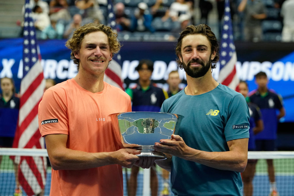 (L-R) Australia's Max Purcell and Jordan Thompson hold the trophy after defeating Germany's Tim Puetz and Kevin Krawietz in their men's doubles final match on day thirteen of the US Open tennis tournament at the USTA Billie Jean King National Tennis Center in New York City, on September 7, 2024. (Photo by TIMOTHY A. CLARY / AFP) (Photo by TIMOTHY A. CLARY/AFP via Getty Images)