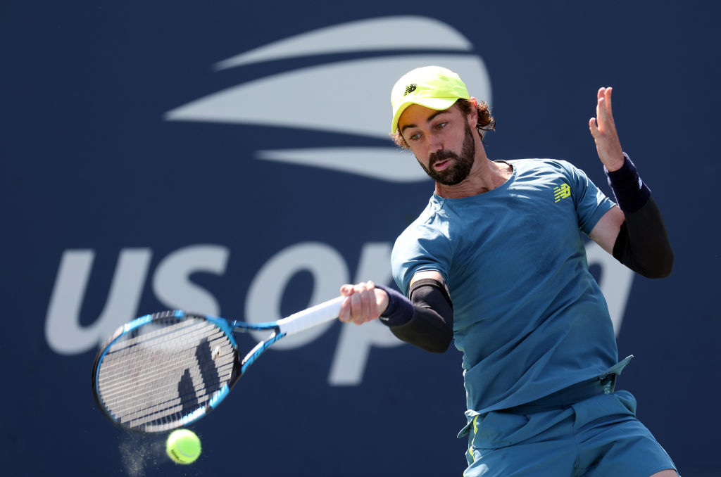 NEW YORK, NEW YORK - AUGUST 27: Jordan Thompson of Australia returns against Constant Lestienne of France during their Men's Singles First Round match on on Day Two of the 2024 US Open at the USTA Billie Jean King National Tennis Center on August 27, 2024 in the Flushing neighborhood of the Queens borough of New York City. (Photo by Jamie Squire/Getty Images)