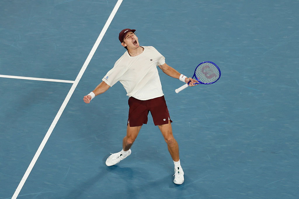 MELBOURNE, AUSTRALIA - JANUARY 23: Alex de Minaur of Australia celebrates winning match point against Frances Tiafoe of the United States during the Men's Singles Third Round match on day six of the 2026 Australian Open at Melbourne Park on January 23, 2026 in Melbourne, Australia. (Photo by Darrian Traynor/Getty Images)