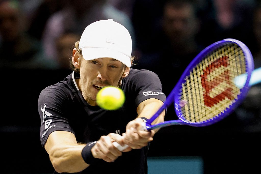 Australia's Alex de Minaur returns the ball to Canada's Felix Auger-Aliassime during the singles final of the Rotterdam tennis tournament in Ahoy Rotterdam on February 15, 2026. (Photo by Bas CZERWINSKI / ANP / AFP via Getty Images) / Netherlands OUT