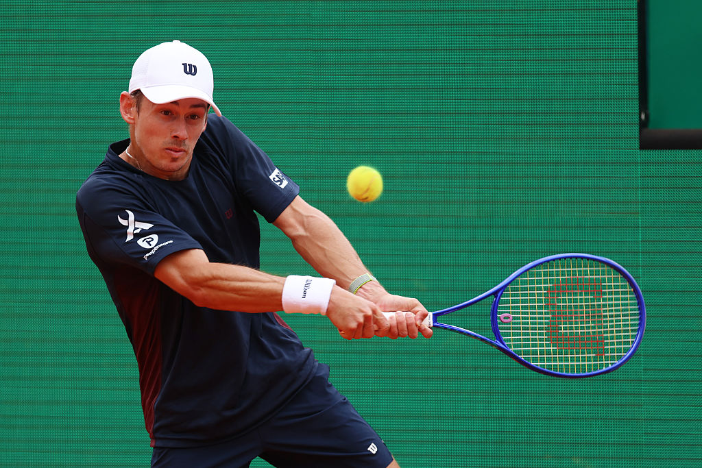 MONTE-CARLO, MONACO - APRIL 10: Alex de Minaur of Australia plays a backhand against Valentin Vacherot of Monaco during the Men's Singles Quarter Final match on day six of the Rolex Monte-Carlo Masters at Monte-Carlo Country Club on April 10, 2026 in Monte-Carlo, Monaco. (Photo by Julian Finney/Getty Images)