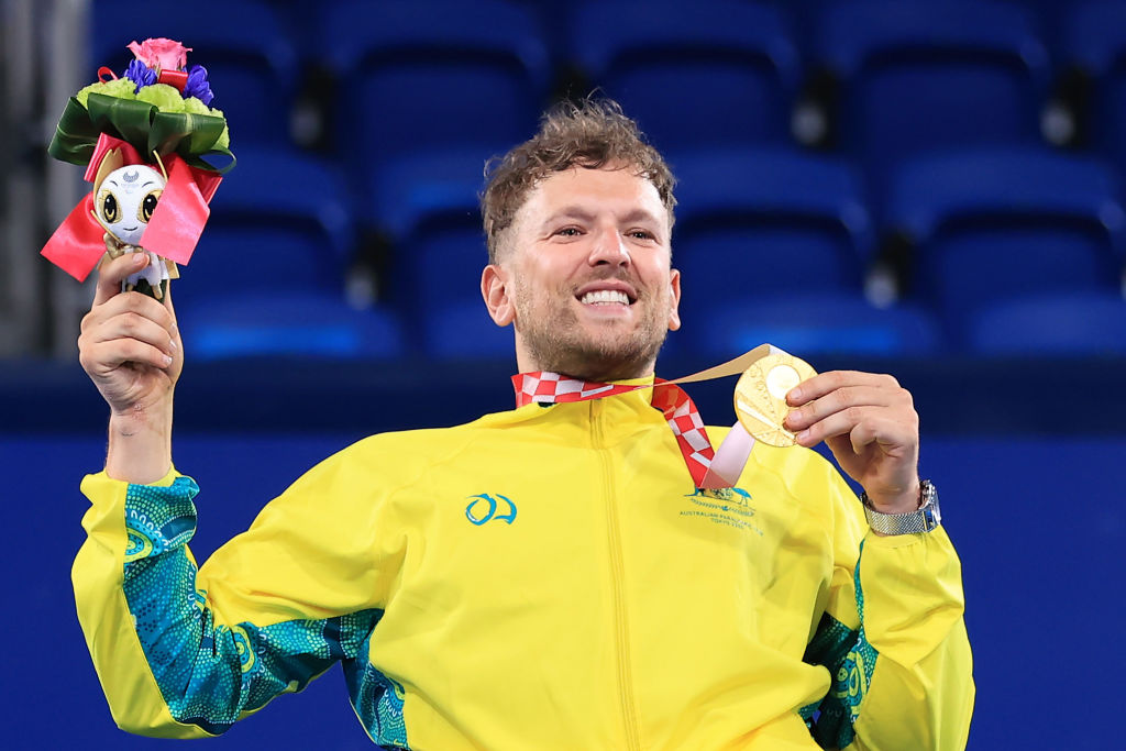 TOKYO, JAPAN - SEPTEMBER 04: Gold medalist  Dylan Alcott of Team Australia reacts in the podium of Men’s Quad Singles on day 11 of the Tokyo 2020 Paralympic Games at Ariake Tennis Park on September 04, 2021 in Tokyo, Japan. (Photo by Carmen Mandato/Getty Images)