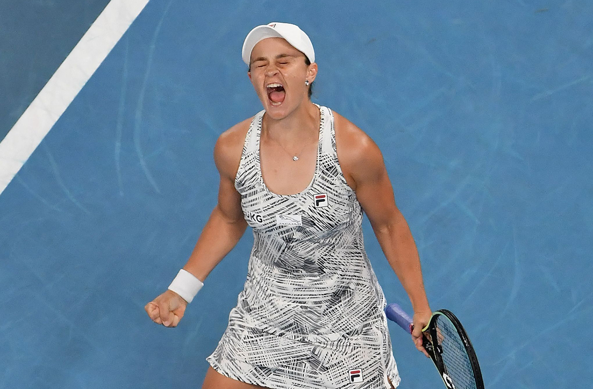 Australia's Ashleigh Barty reacts after winning against Danielle Collins of the US during their women's singles final match on day thirteen of the Australian Open tennis tournament in Melbourne on January 29, 2022. - -- IMAGE RESTRICTED TO EDITORIAL USE - STRICTLY NO COMMERCIAL USE -- (Photo by Paul Crock / AFP) / -- IMAGE RESTRICTED TO EDITORIAL USE - STRICTLY NO COMMERCIAL USE -- (Photo by PAUL CROCK/AFP via Getty Images)