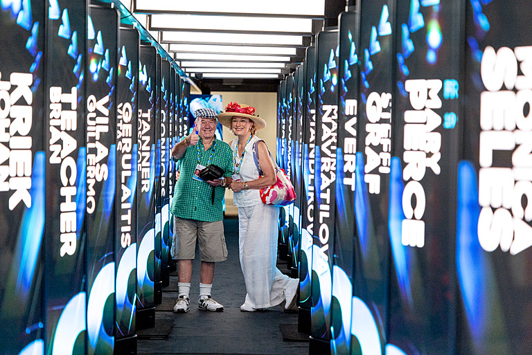 Couple receives a tour of Melbourne Park after winning the ATF Lottery during the Australian Open at Melbourne Park in Melbourne on Sunday, January 30, 2022.  MANDATORY PHOTO CREDIT Luis Enrique Ascui/TENNIS AUSTRALIA