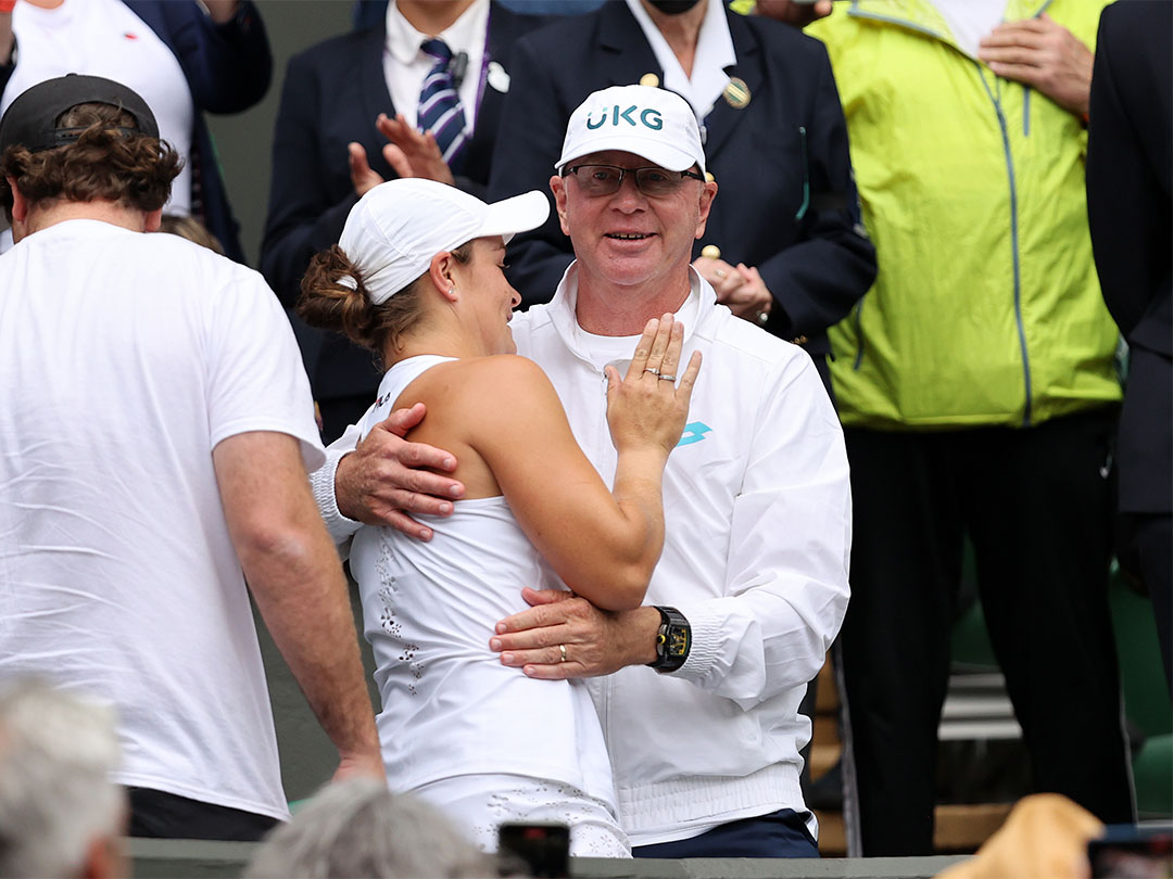 LONDON, ENGLAND - JULY 10: Ashleigh Barty of Australia celebrates with coach Craig Tyzzer after winning her Ladies' Singles Final match against Karolina Pliskova of The Czech Republic  on Day Twelve of The Championships - Wimbledon 2021 at All England Lawn Tennis and Croquet Club on July 10, 2021 in London, England. (Photo by Clive Brunskill/Getty Images)
