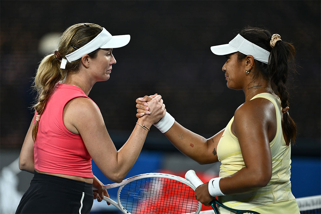 MELBOURNE, AUSTRALIA - JANUARY 16: Danielle Collins of the United States shakes hands with Destanee Aiava of Australia following victory in the Women's Singles Second Round match during day five of the 2025 Australian Open at Melbourne Park on January 16, 2025 in Melbourne, Australia. (Photo by Hannah Peters/Getty Images)