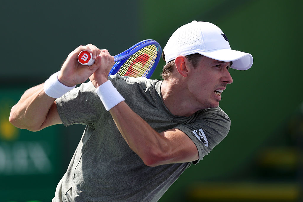 INDIAN WELLS, CALIFORNIA - MARCH 09:  Alex de Minaur of Australia plays a backhand against Cameron Norrie of Great Britain in their third round match of the BNP Paribas Open at Indian Wells Tennis Garden on March 09, 2026 in Indian Wells, California. (Photo by Clive Brunskill/Getty Images)
