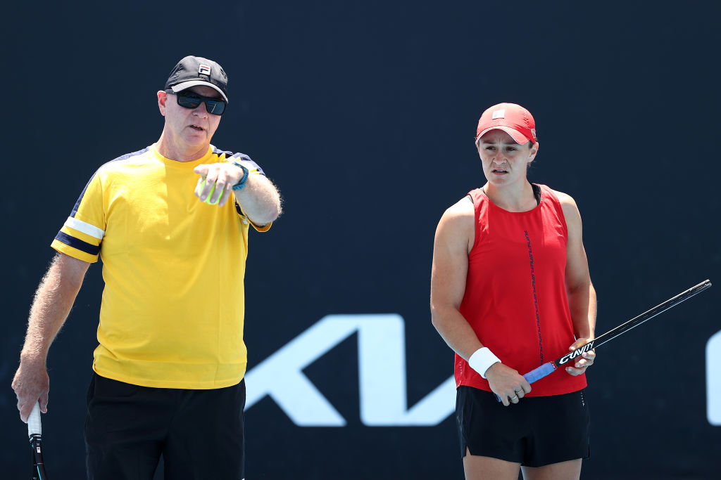MELBOURNE, AUSTRALIA - JANUARY 18: Ashleigh Barty of Australia talks to her coach Craig Tyzzer during a practice session during day two of the 2022 Australian Open at Melbourne Park on January 18, 2022 in Melbourne, Australia. (Photo by Cameron Spencer/Getty Images)