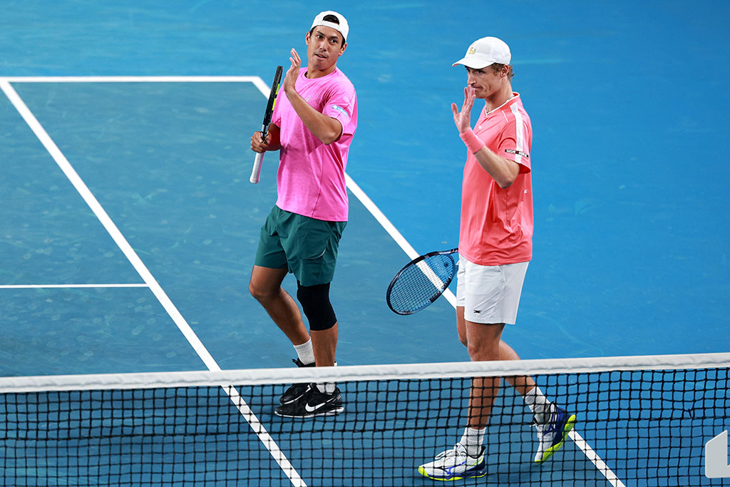 MELBOURNE, AUSTRALIA - JANUARY 22: Marc Polmans and Jason Kubler of Australia acknowledge the crowd after victory over Thanasi Kokkinakis of Australia and Nick Kyrgios of Australia in the Men's First Round Doubles match on day five of the 2026 Australian Open at Melbourne Park on January 22, 2026 in Melbourne, Australia. (Photo by Lintao Zhang/Getty Images)