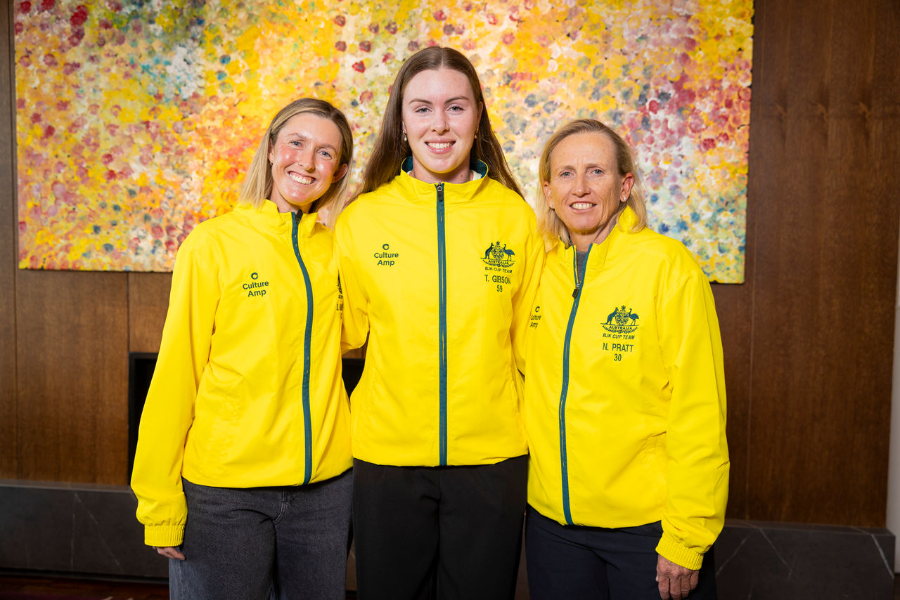 November 10: Storm Hunter (AUS) (L) and Nicole Pratt (AUS) (R) present Talia Gibson (AUS) with her yellow jacket as she debuts in the Australian team. Billie Jean King Cup play-off at Domain Tennis Centre, Hobart, Tasmania on Monday, November 10, 2025. Photo by TENNIS AUSTRALIA/ RICHARD JUPE