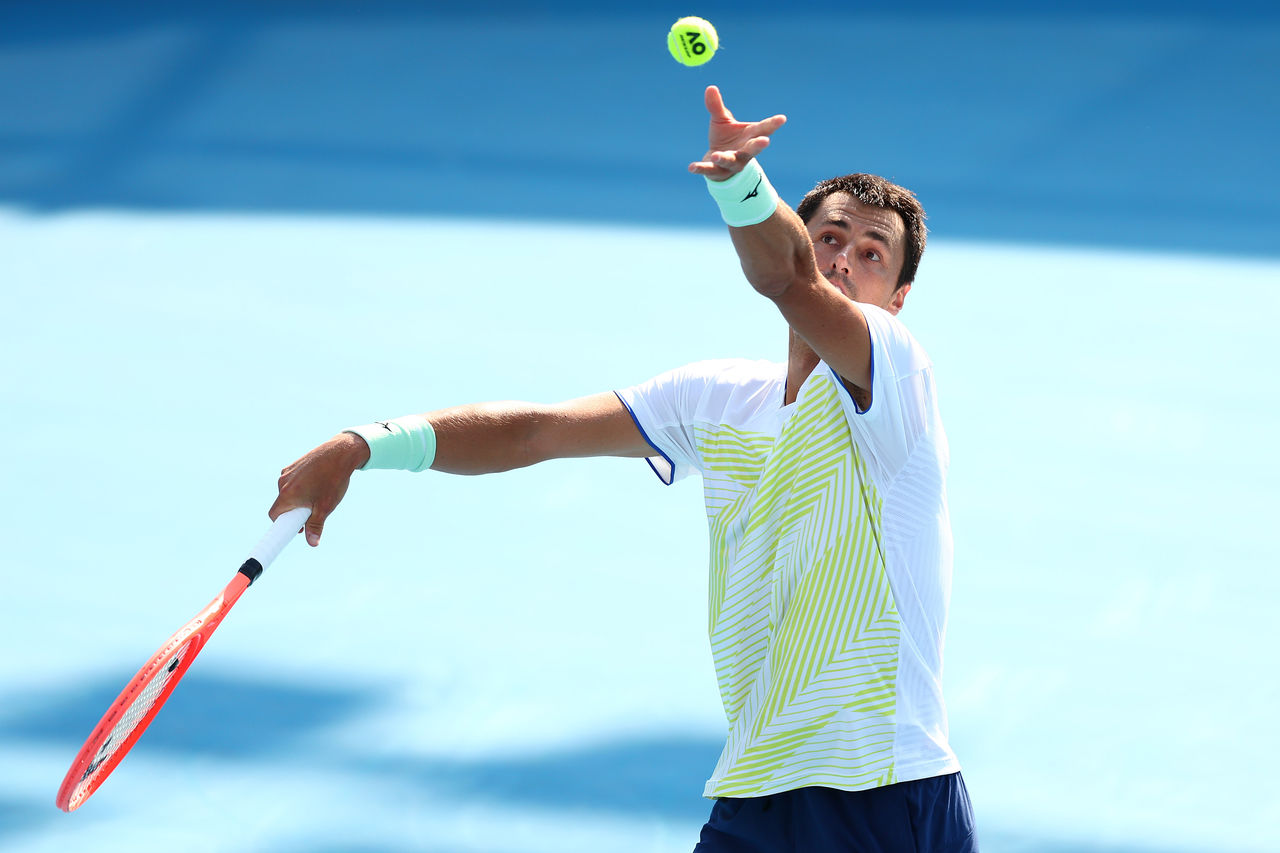 Bernard Tomic serves in his first-round match of Australian Open qualifying . Photo credit: Getty Images