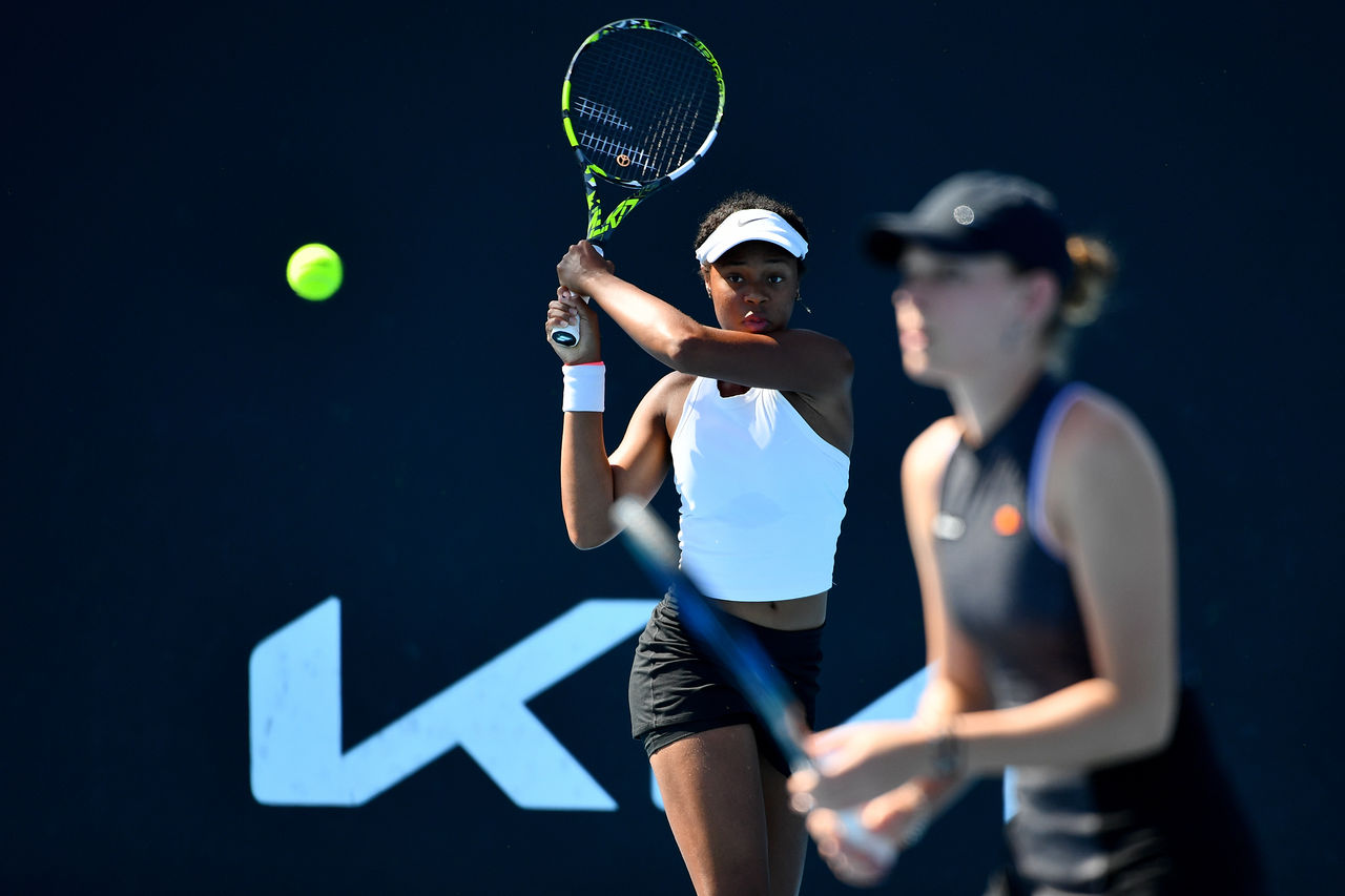 Lily TAYLOR (AUS) and Mara GAE (ROU) play Ranah Akua STOIBER (GBR) and Nikola DAUBNEROVA (SVK) on Court 13, Day 8 of the 2023 Australian Open at Melbourne Park, Monday, January 23, 2023. MANDATORY PHOTO CREDIT Tennis Australia/ JOSH CHADWICK