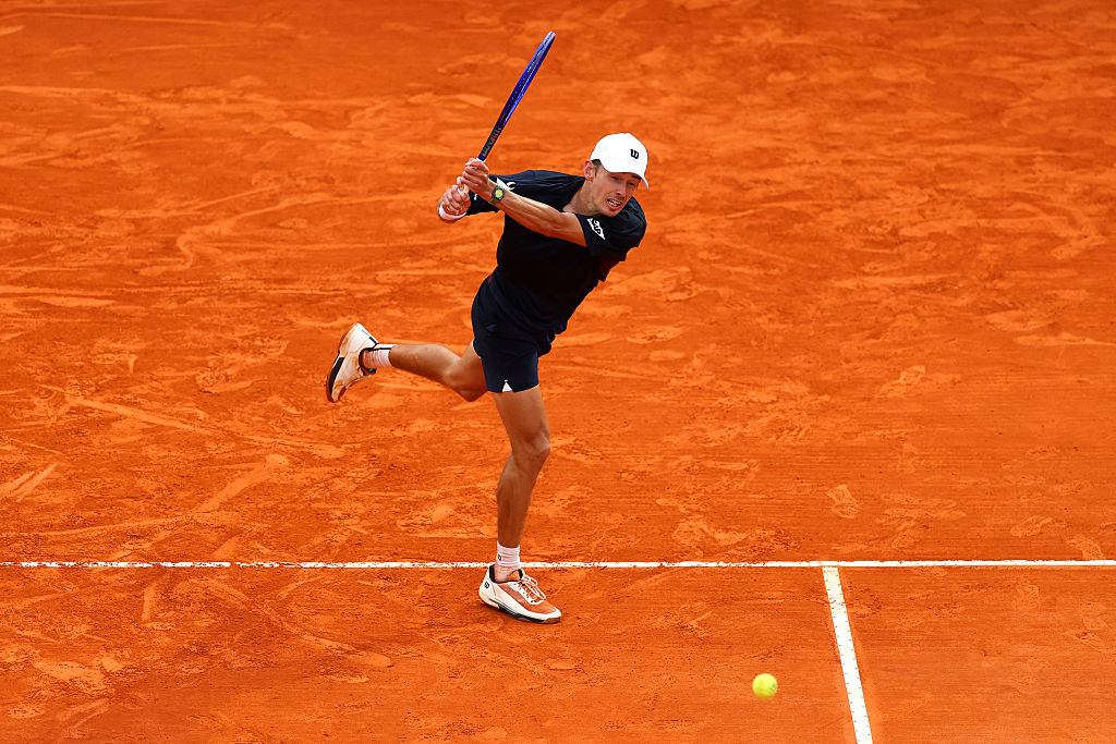 MONTE-CARLO, MONACO - APRIL 10: Alex de Minaur of Australia plays a backhand against Valentin Vacherot of Monaco during the Men's Singles Quarter Final match on day six of the Rolex Monte-Carlo Masters at Monte-Carlo Country Club on April 10, 2026 in Monte-Carlo, Monaco. (Photo by Julian Finney/Getty Images)