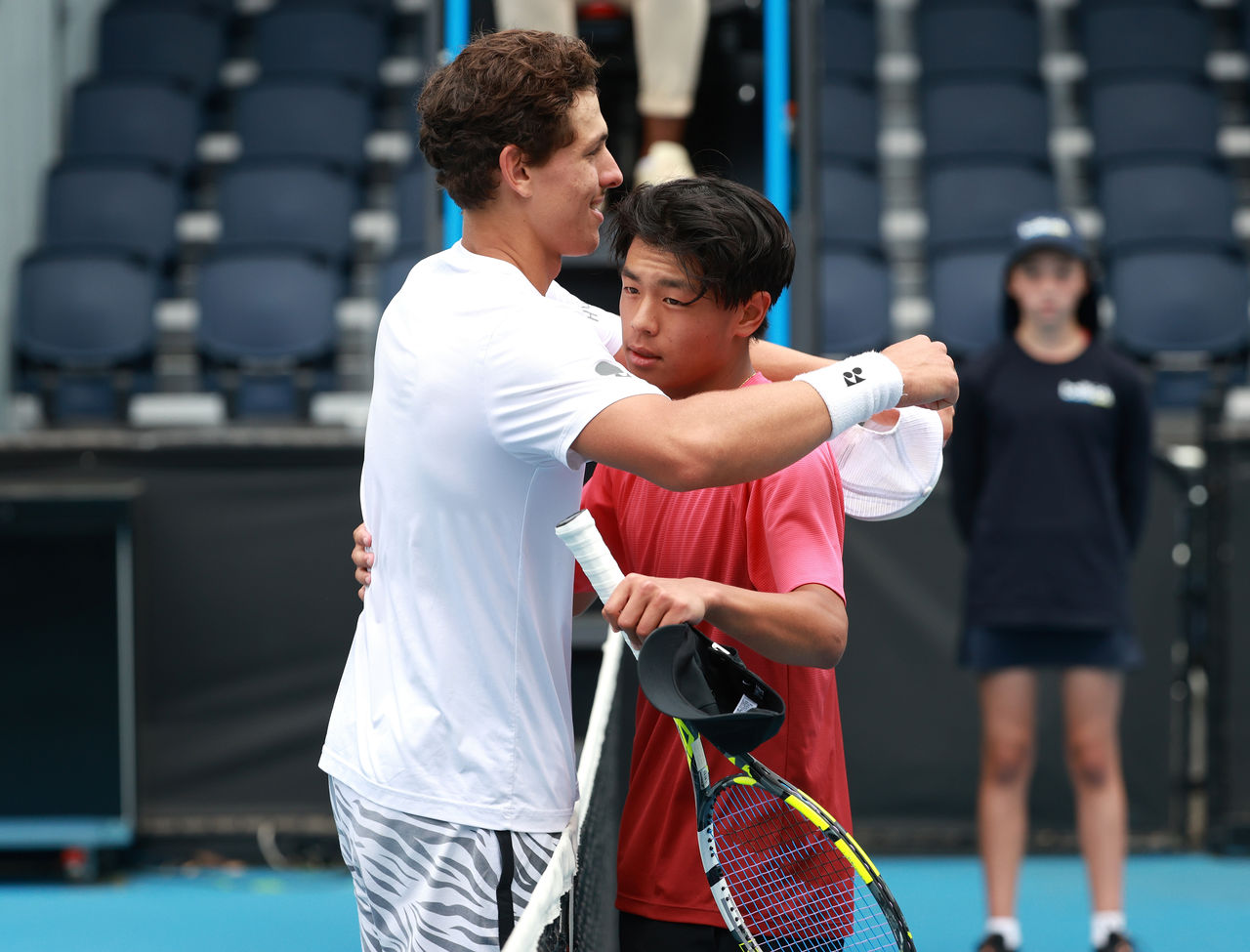 Daniel Jovanovski of Victoria (L) celebrates his victory over Chase Zhao of New South Wales in the U16 Boys final at the 2023 December Showdown at Melbourne Park on Saturday, December 16, 2023. Photo by TENNIS AUSTRALIA/ HAMISH BLAIR