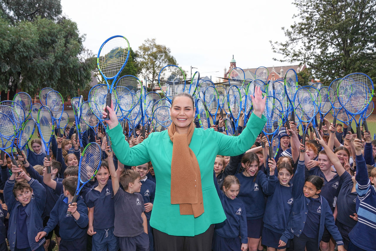 June 25: Jelena Dokic poses with school children during the Wimbledon Preview and Racquet Roadshow Launch at Middle Park Primary School in Melbourne, Australia on Tuesday, June 25, 2024. Photo by TENNIS AUSTRALIA/ SCOTT BARBOUR