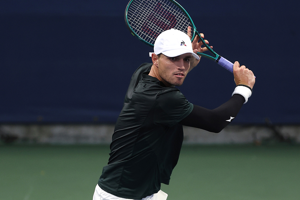 NEW YORK, NEW YORK - AUGUST 27: Christopher O'Connell of Australia returns against Nicolas Jarry of Chile during their Men's Singles First Round match on Day Two of the 2024 US Open at the USTA Billie Jean King National Tennis Center on August 27, 2024 in the Flushing neighborhood of the Queens borough of New York City. (Photo by Jamie Squire/Getty Images)