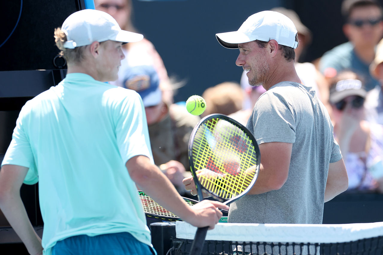 MELBOURNE, AUSTRALIA - JANUARY 09: Lleyton Hewitt speaks with Cruz Hewitt during a training session ahead of the 2024 Australian Open at Melbourne Park on January 09, 2024 in Melbourne, Australia. (Photo by Kelly Defina/Getty Images)
