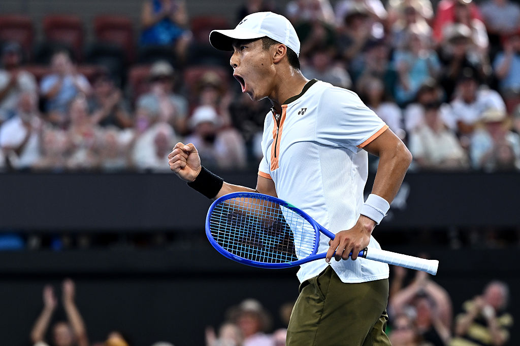BRISBANE, AUSTRALIA - JANUARY 08: Rinky Hijikata of Australia  celebrates a point in his second round Men's Singles match against Giovanni Mpetshi Perricard of France during day five of the 2026 Brisbane International at Pat Rafter Arena on January 08, 2026 in Brisbane, Australia. (Photo by Albert Perez/Getty Images)