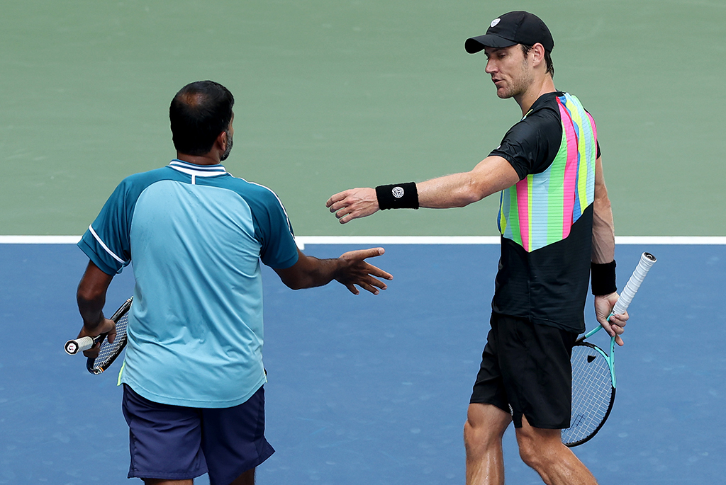 NEW YORK, NEW YORK - SEPTEMBER 07: Rohan Bopanna (L) of India and Matthew Ebden (R) of Australia celebrateagainst Pierre-Hugues Herbert and Nicolas Mahut of France during their Men's Doubles Semifinal match on Day Eleven of the 2023 US Open at the USTA Billie Jean King National Tennis Center on September 07, 2023 in the Flushing neighborhood of the Queens borough of New York City. (Photo by Mike Stobe/Getty Images)