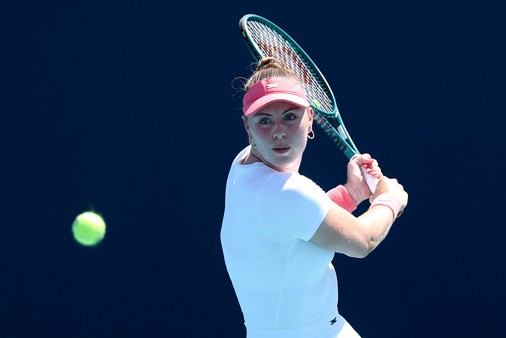 MIAMI GARDENS, FLORIDA - MARCH 22: Talia Gibson of Australia returns a shot to Iva Jovic of the United States on Day 6 of the Miami Open Presented by Itau at Hard Rock Stadium on March 22, 2026 in Miami Gardens, Florida. (Photo by Matthew Stockman/Getty Images)