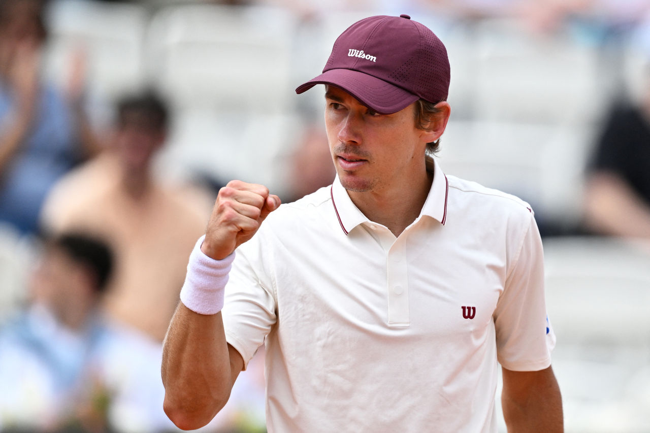Australia's Alex de Minaur reacts after a point as he plays against Italy's Matteo Arnaldi during their men's singles match of the WTA Rome Open tennis tournament at the Foro Italico in Rome on May 8, 2026. (Photo by Tiziana FABI / AFP via Getty Images)