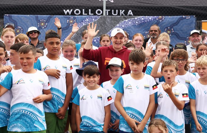 NEWCASTLE, AUSTRALIA - APRIL 06:  Ash Barty poses with participants during the National Indigenous Tennis Carnival Launch District Park Tennis at on April 06, 2023 in Newcastle, Australia. (Photo by Matt King/Getty Images for Tennis Australia)