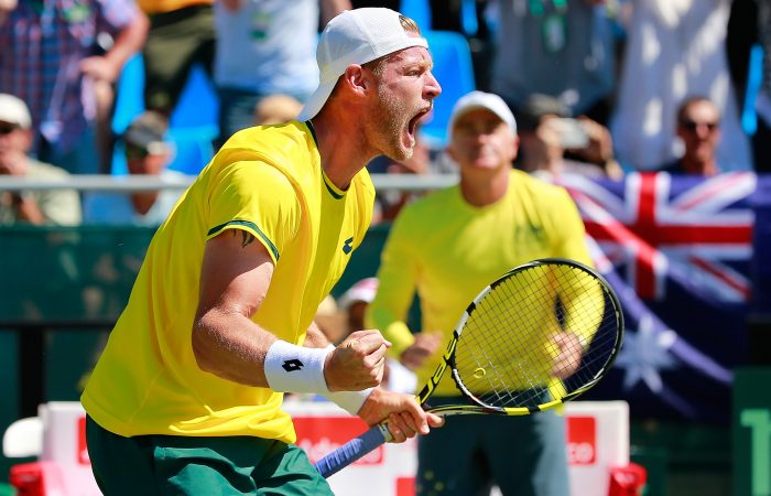 DARWIN, AUSTRALIA - JULY 18:  Sam Groth of Australia celebrates winning a point as Wally Masur, captain of Australia  looks on as Sam Groth and Lleyton Hewitt of Australia play Andrey Golubev and Aleksandr Nedovyesov of Kazakhstan in the doubles during day two of the Davis Cup World Group quarterfinal tie between Australia and Kazakhstan at Marrara Sporting Complex on July 18, 2015 in Darwin, Australia.  (Photo by Scott Barbour/Getty Images)