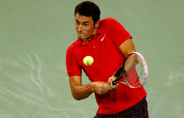Bernard Tomic plays a backhand during his third-round victory over Richard Gasquet at the Shanghai Rolex Masters; Getty Images