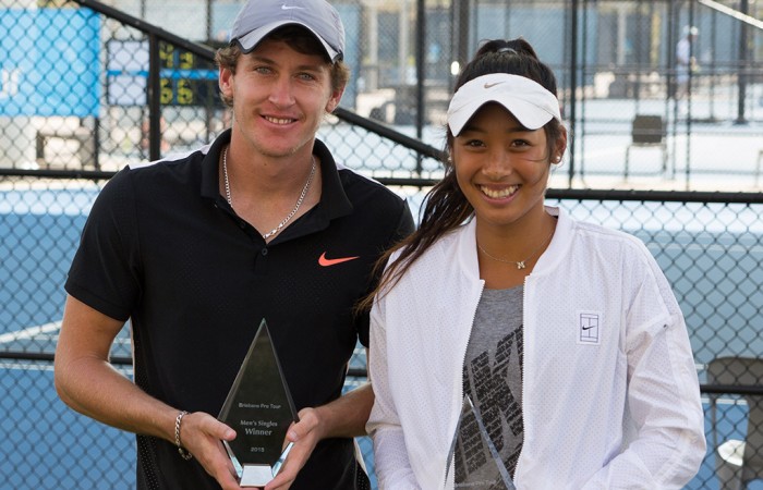 Gavin Van Peperzel (L) and Priscilla Hon pose with their trophies after winning the men's and women's Pro Tour titles; Tennis Australia