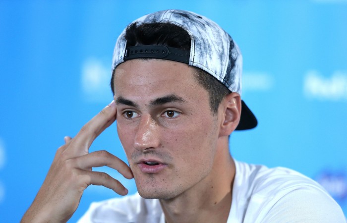 SYDNEY, AUSTRALIA - JANUARY 15: Bernard Tomic of Australia speaks in a press conference after forfeiting his quarter final match against Teymuraz Gabashvili of Russia during day six of the 2016 Sydney International at Sydney Olympic Park Tennis Centre on January 15, 2016 in Sydney, Australia. (Photo by Mark Metcalfe/Getty Images)