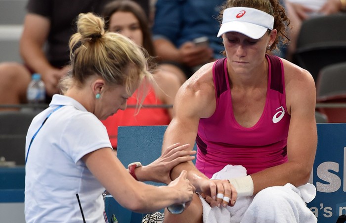 Sam Stosur gets treatment on her wrist during her first-round win over Jana Cepelova at Brisbane International 2016; Getty Images