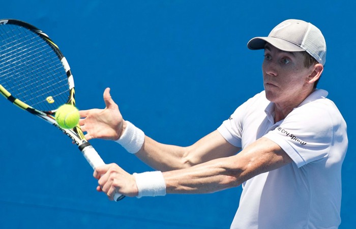 John-Patrick Smith in action during the Australian Open 2015 Play-off; Elizabeth Xue Bai