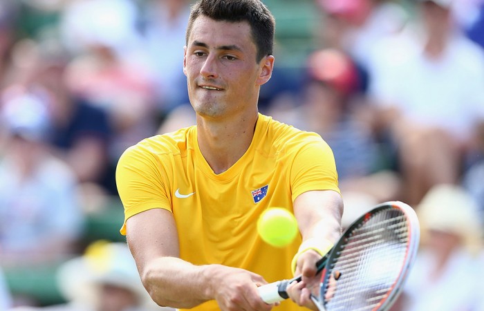 Bernard Tomic in action during his victory over Jack Sock in the Australia v United States Davis Cup World Group first-round tie at Kooyong Lawn Tennis Club; Getty Images