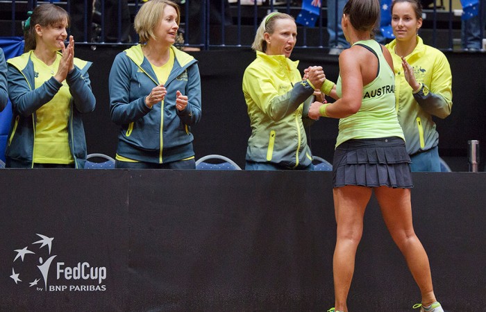 Casey Dellacqua shakes hand with Australian coach, Nicole Pratt after winning the second singles rubber of the Netherlands vs Australia Fed Cup World Group Play-off tie; Henk Koster