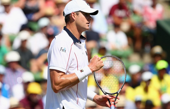 John Isner in action against Bernard Tomic in the first of the reverse singles rubbers of the Australia v United States Davis Cup tie at Kooyong; Getty Images