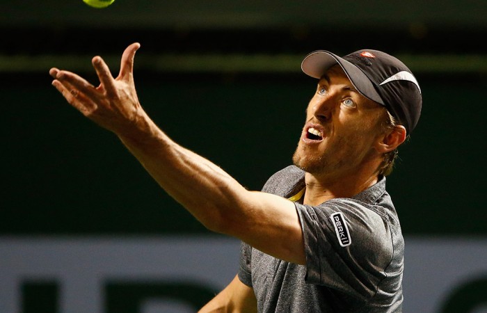 John Millman serves during his second-round defeat to No.30 seed Steve Johnson at the BNP Paribas Open in Indian Wells; Getty Images