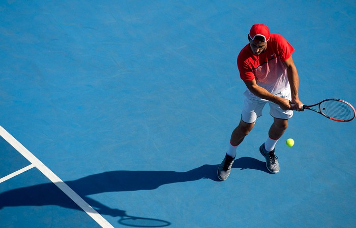Bernard Tomic in action at the ATP event in Acapulco, Mexico; photo credit @AbiertoMexicano