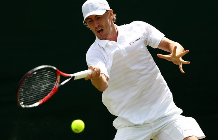 John Millman competing at the All England Lawn Tennis and Croquet Club for Wimbledon 2016.