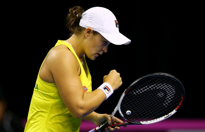 WOLLONGONG, AUSTRALIA - APRIL 22:  Ashleigh Barty of Australia celebrates a point in her match against Lesley Kerkhove of the Netherlands during the World Group Play-Off Fed Cup tie between Australia and the Netherlands at the Wollongong Entertainment Centre on April 22, 2018 in Wollongong, Australia.  (Photo by Mark Nolan/Getty Images)